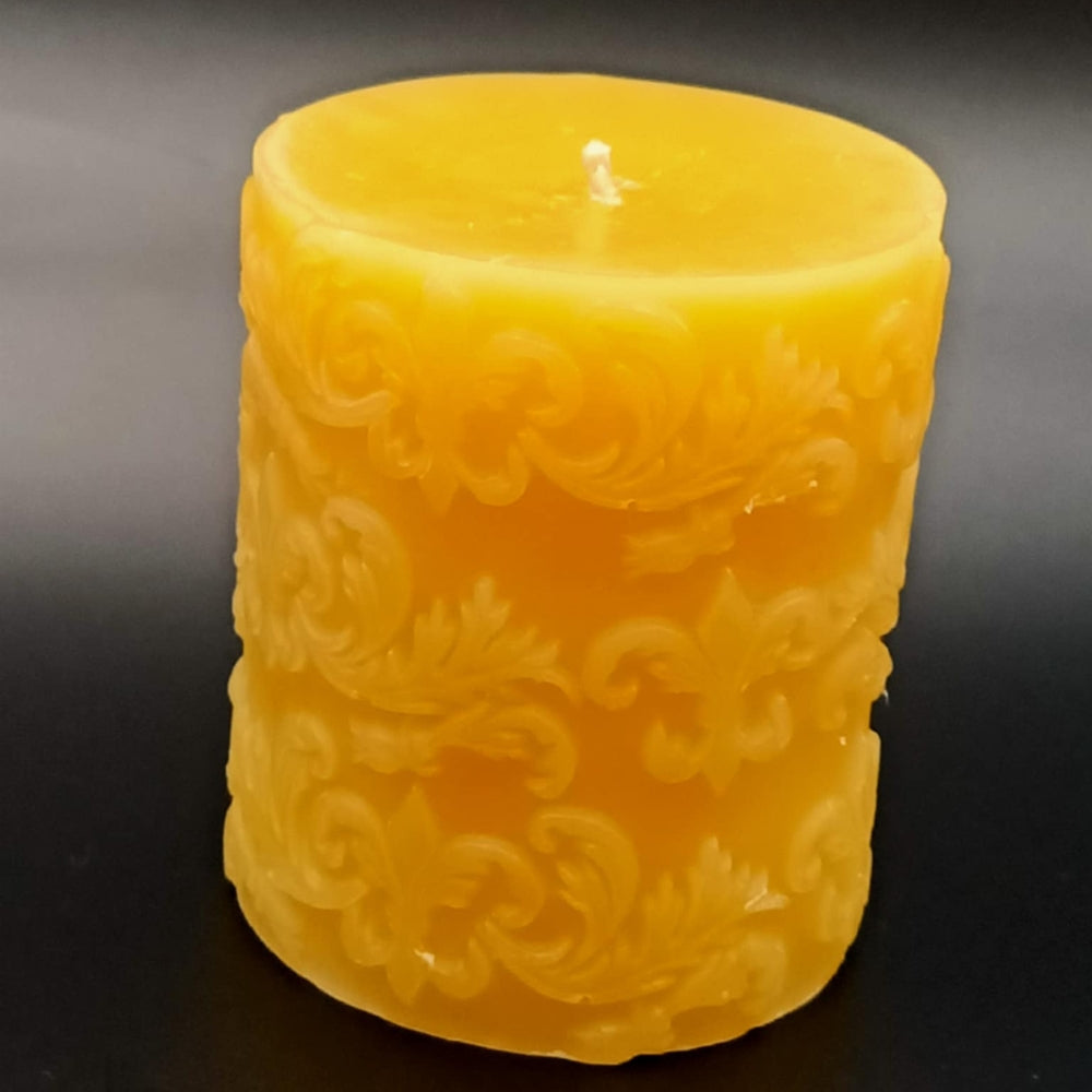 Hand-poured pure Australian beeswax Fleur de Lis pillar candle with scrollwork detail by Suz E Bee Candles, Port Stephens NSW