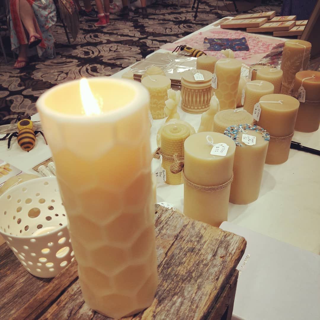 Suz E Bee Candles honeycomb beeswax pillar candles on display at market stall, Port Stephens NSW